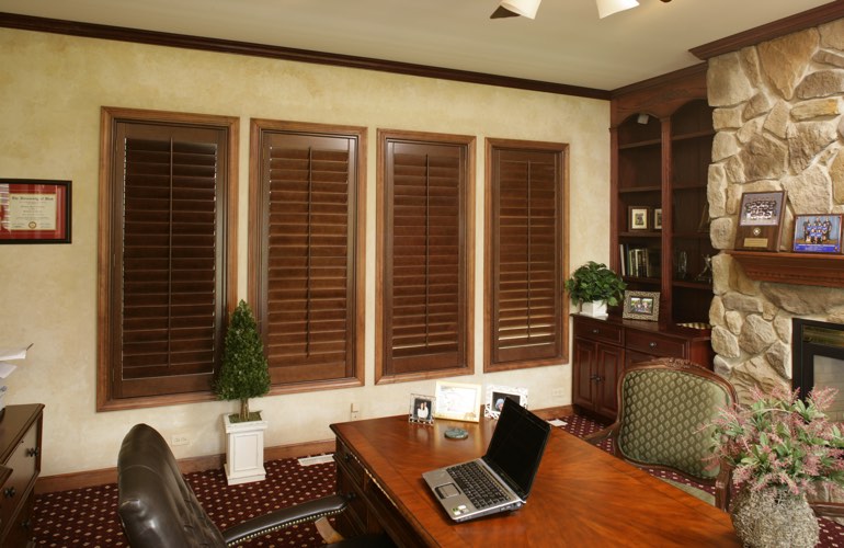 Hardwood plantation shutters in a Miami home office